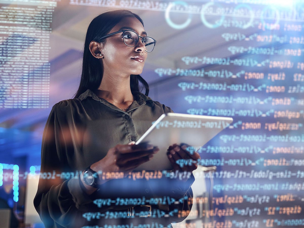 woman-studying-high-tech-health-data-on-screen-WEB